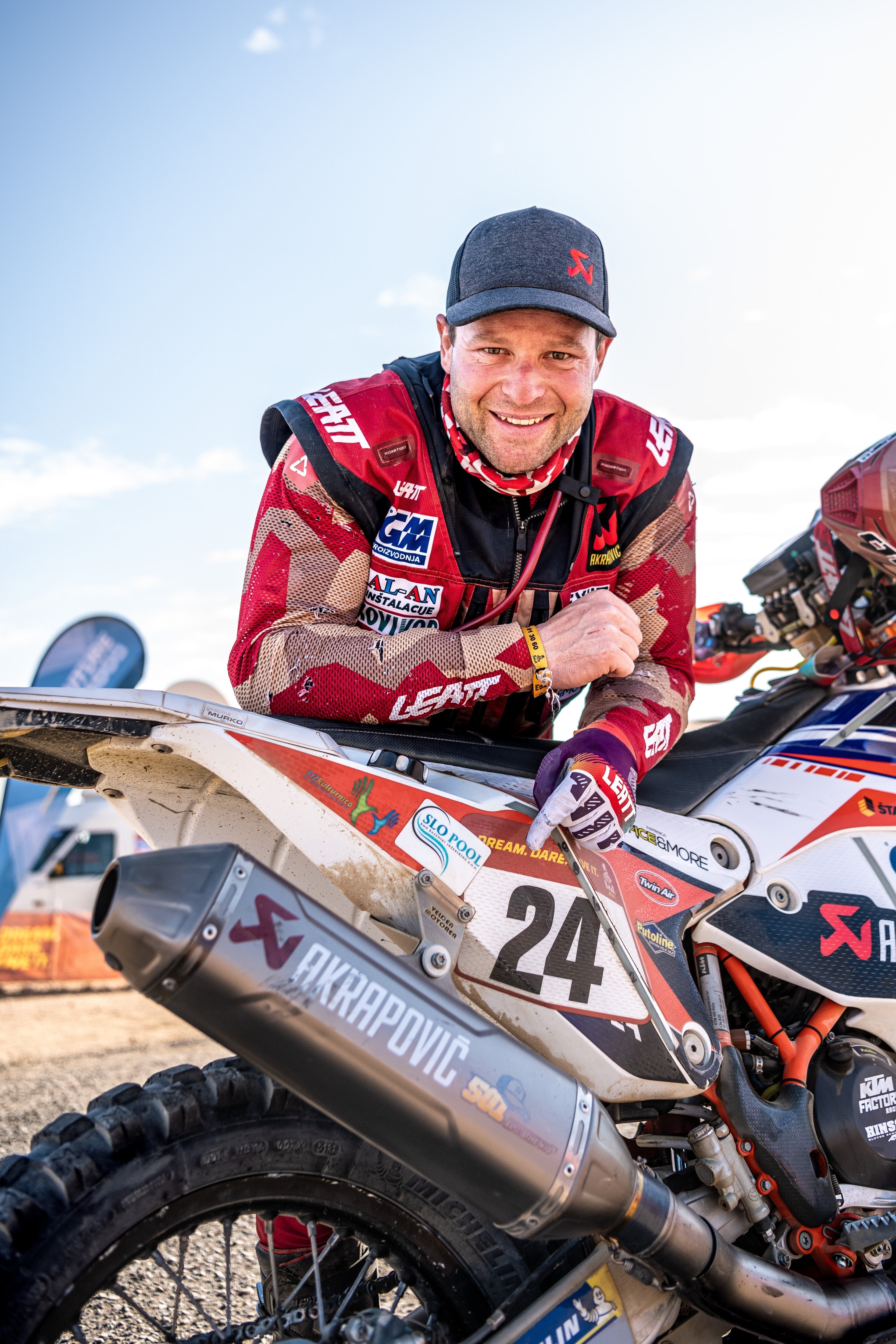 Toni Mulec leaning on bike